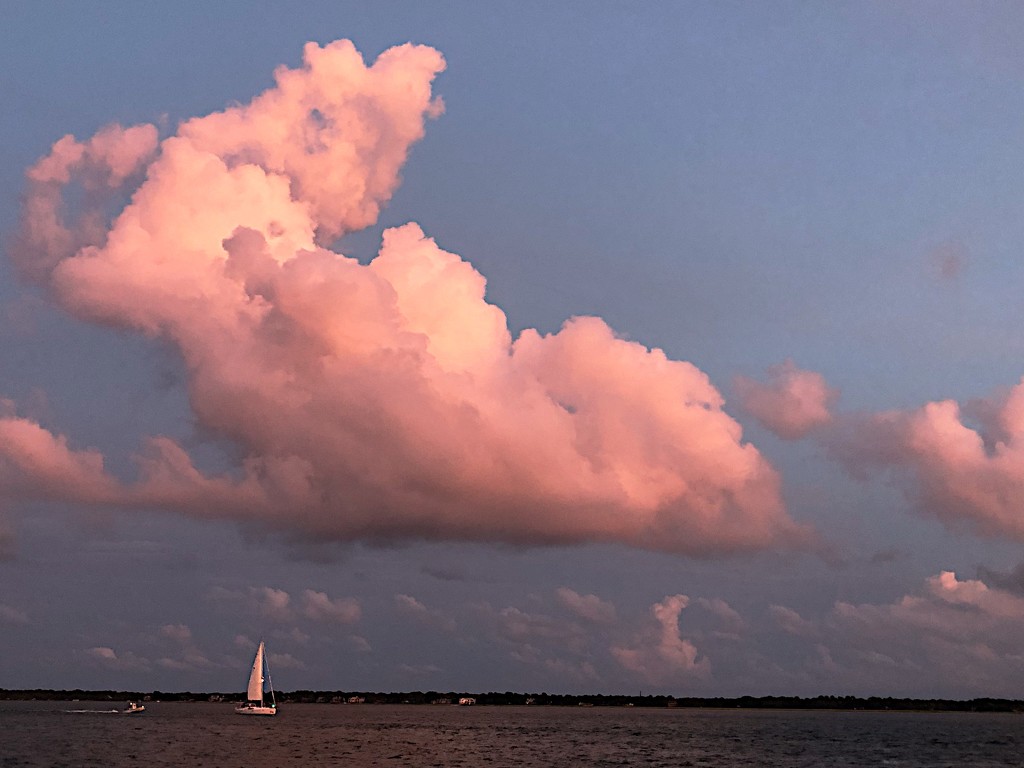 Clouds and sailboat at sunset, Ashley River at Charleston Harbor by congaree