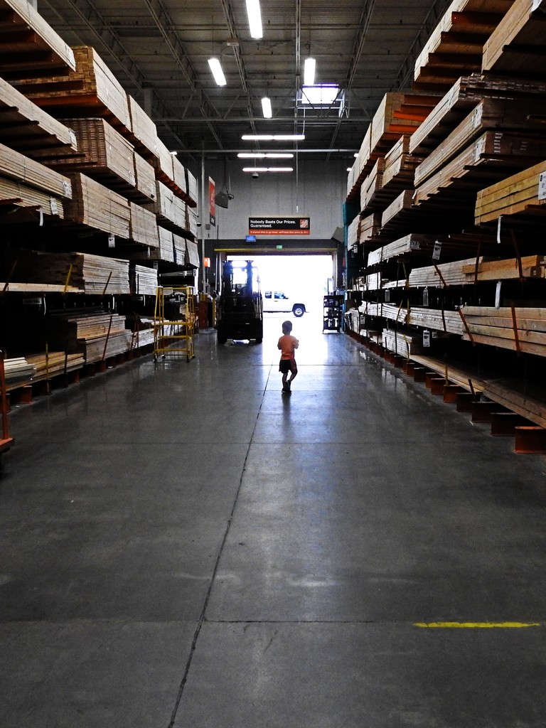 Toddler Making a Break for it in Home Depot by janeandcharlie