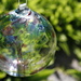 Glass globe in the garden by jdraper