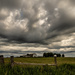 Clouds overlooking a Farm by radiogirl