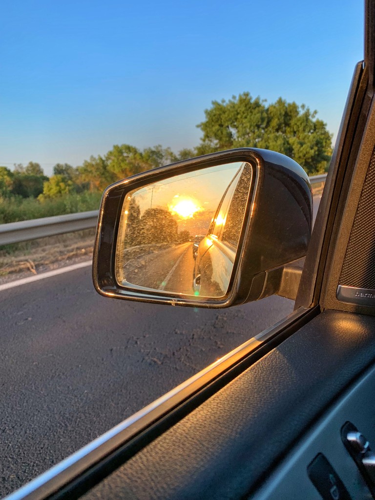 Sunset in the rearview mirror. by cocobella