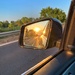 Sunset in the rearview mirror. by cocobella