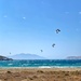 Four kite surfers.  by cocobella