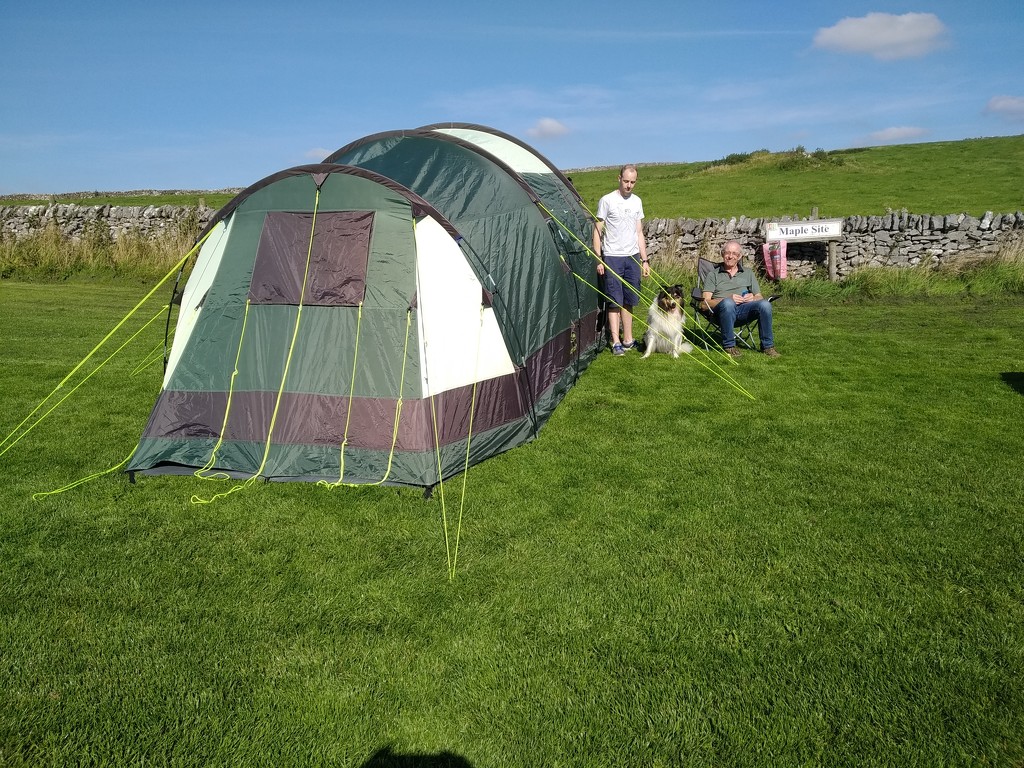 Two men a dog and a tent. by brennieb