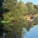 I was drawn to the brightness of the back of the narrow boat amongst the green by 365anne
