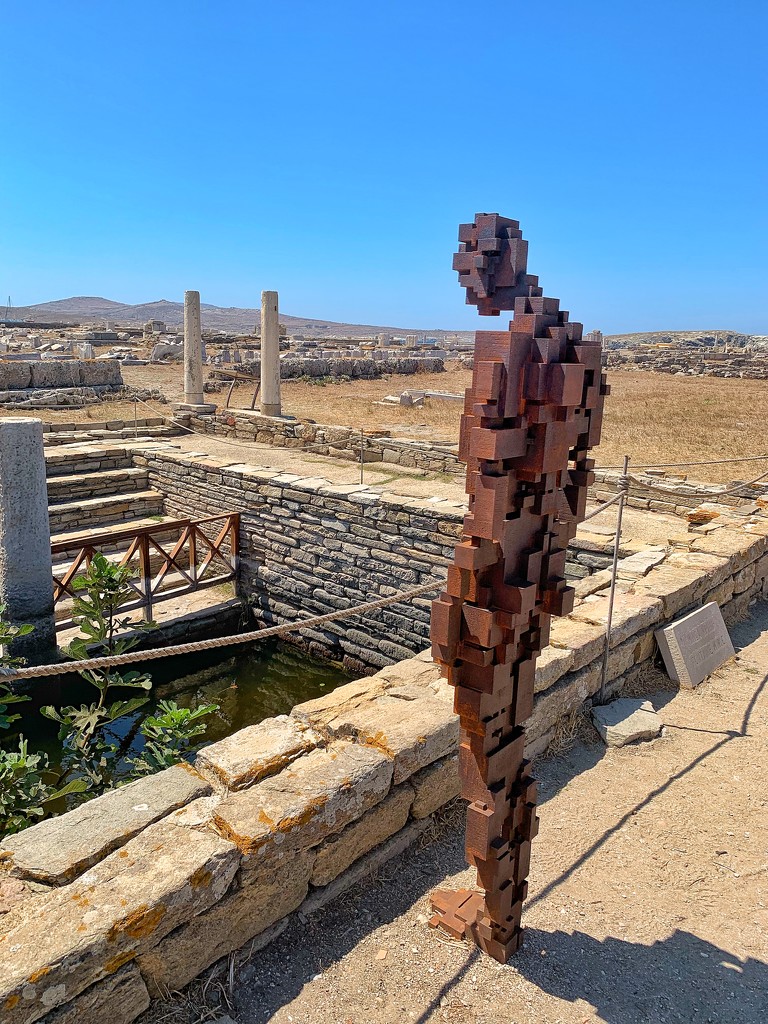 Antony Gormley statue in Delos.  by cocobella