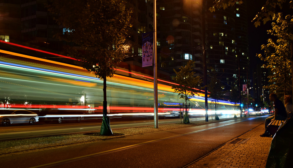 two streetcars passing in the night by summerfield