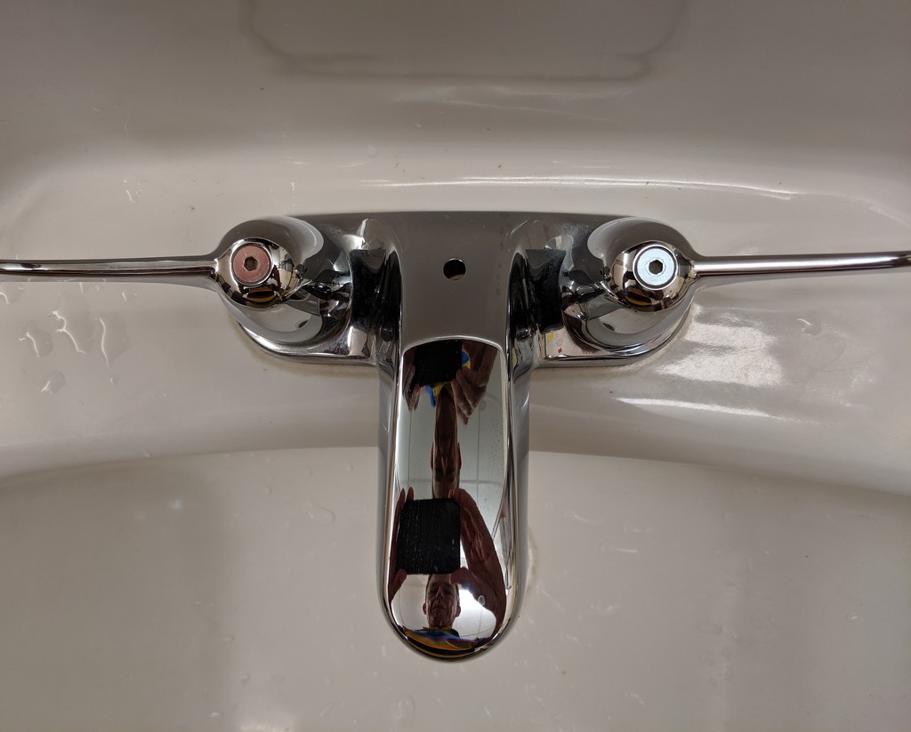 Face in the Faucet by tdaug80