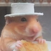 Hamster Eating on TV  by sfeldphotos