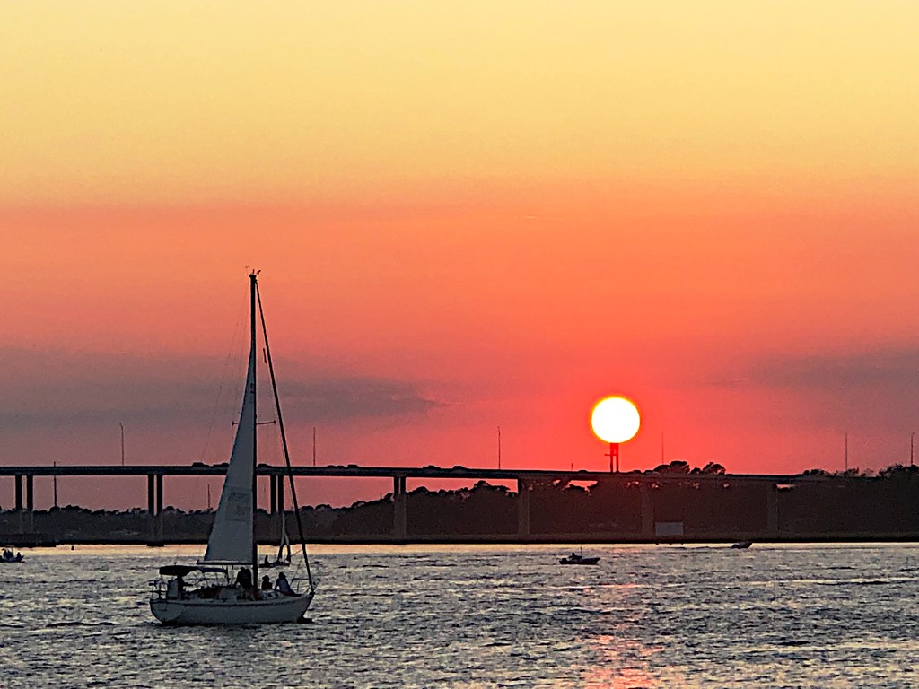 Sailboat at sunset, Ashley River at Charleston Harbor by congaree