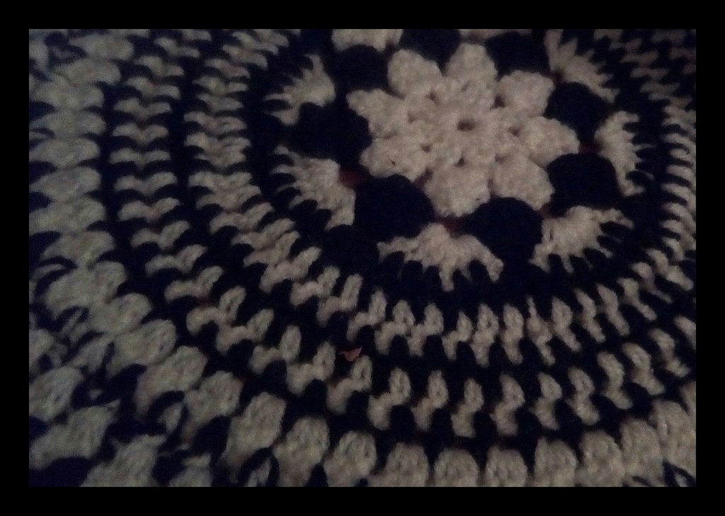 A crocheted table mat. by grace55