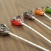 Mickey Mouse Lollipops on Table  by sfeldphotos