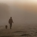 man and dog in fog  by shepherdmanswife