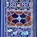 Detail of a door in Charleston’s historic district with stained glass. by congaree