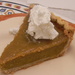 Slice of Pumpkin Pie with Whipped Cream by sfeldphotos