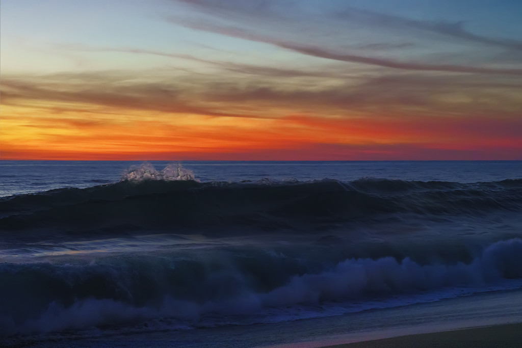 Waves Role In At Sunset by jgpittenger