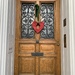 Red heart on a door.  by cocobella