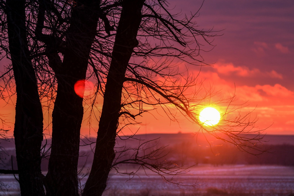 Sunset Over Wintry Pastoral Landscape by kareenking