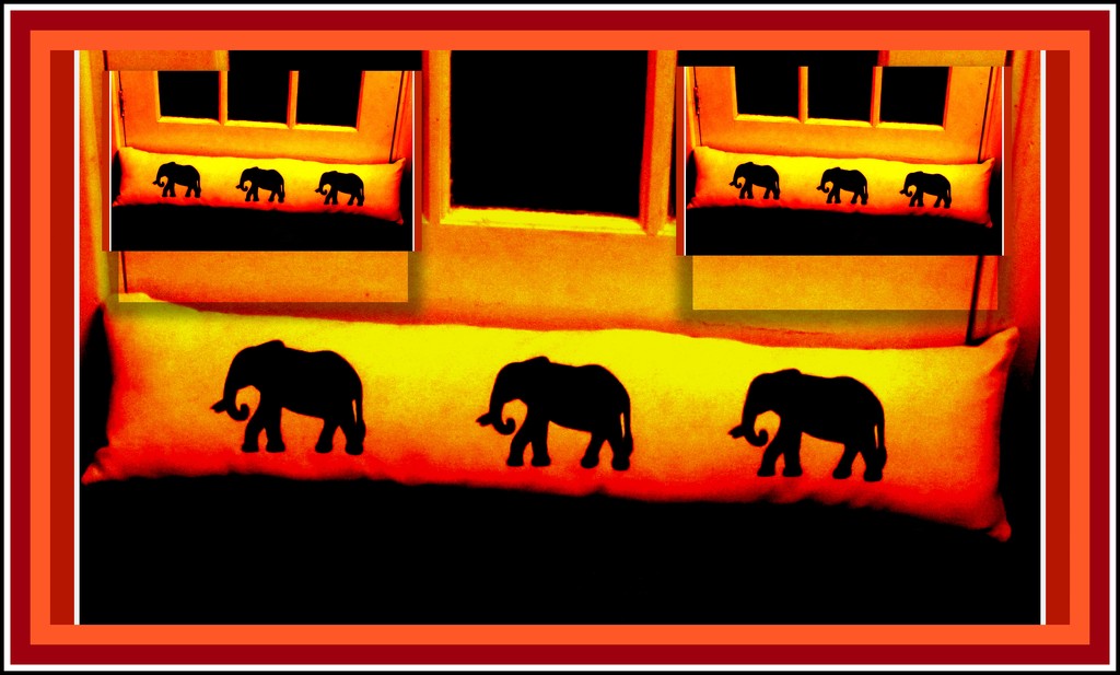 Elephants on a draught excluder by grace55