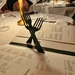A menu with forks.  by cocobella
