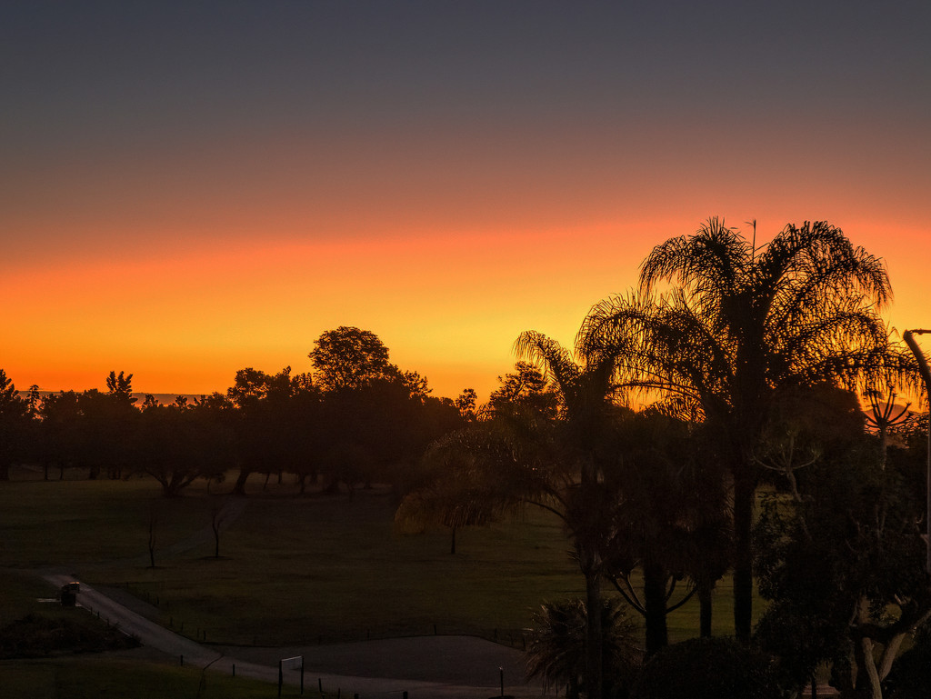 Sunset over the golf club by ludwigsdiana