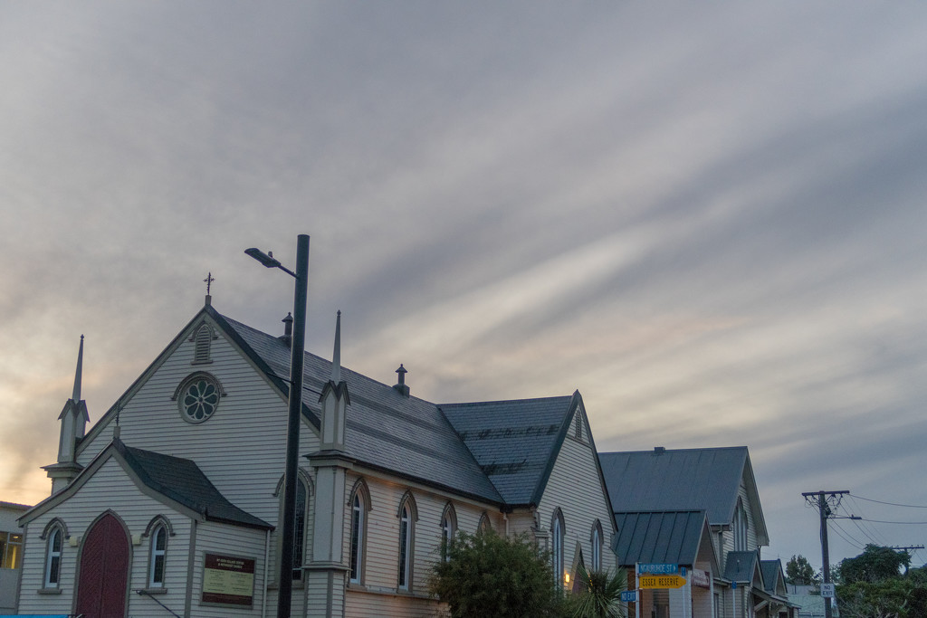 Interesting cloud streak over church by creative_shots