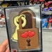 Two tiny red hearts on a chocolate locker.  by cocobella