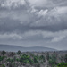 Storm Clouds over Mountains by k9photo