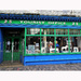 Clonakilty Main Street : the green and blue Tourist Office by etienne