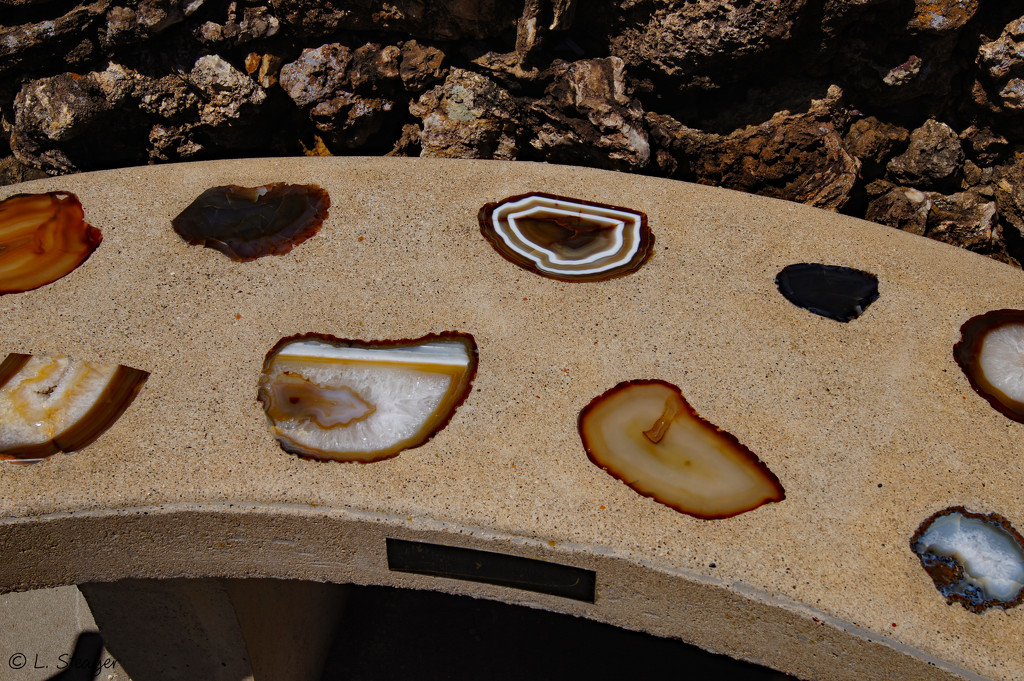 Bench with crystal  cut rocks by larrysphotos