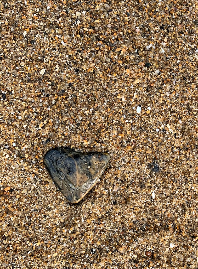 Heart rock on the beach.  by cocobella