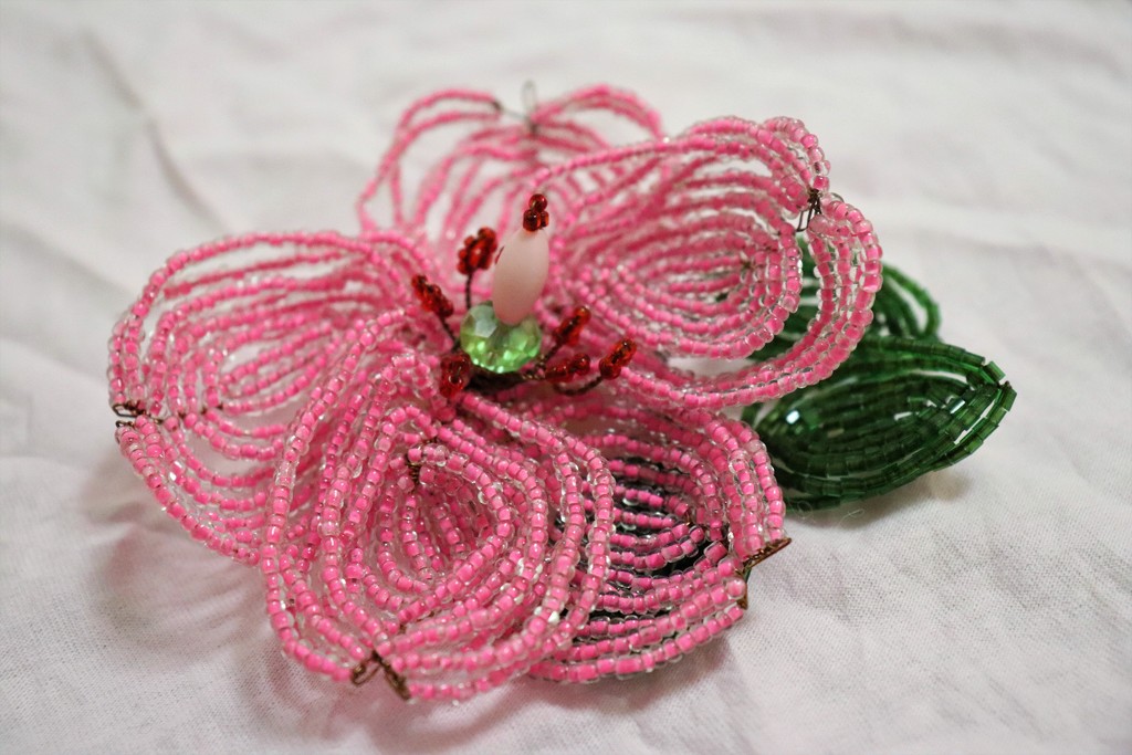My friend makes such beautiful flowers from beads. by nyngamynga