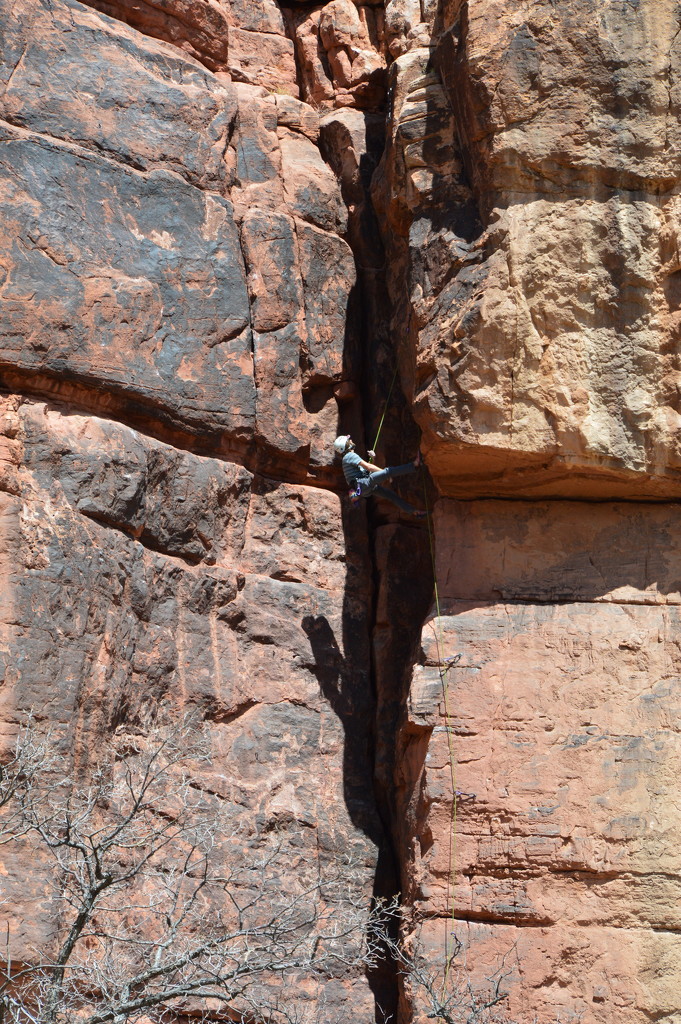 Rock Climber In Blue Water Canyon. by bigdad