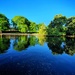 Blue sky pond  by isaacsnek