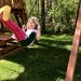 Getting the hang of swinging herself  by mdoelger