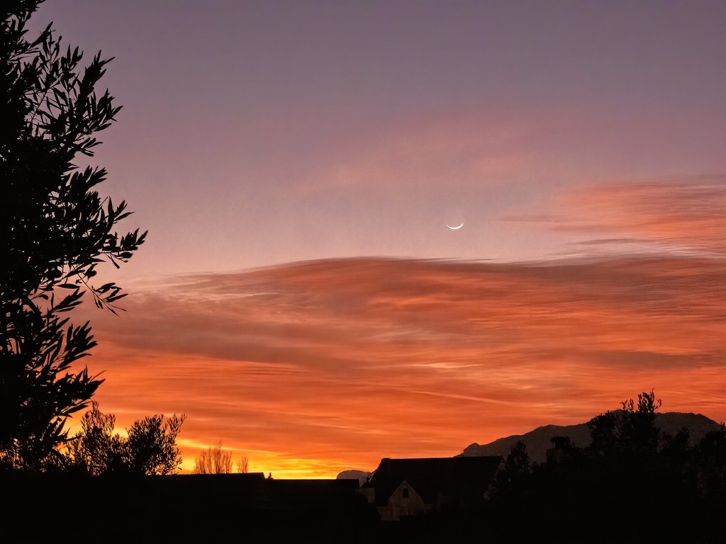 Sunrise with a strip of moon. by ludwigsdiana
