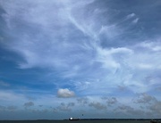 30th May 2020 - Freighter leaving Charleston Harbor under vast cloud-filled skies.