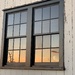 Sunset reflected in a window by pfaith7