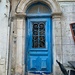 Two hearts on a blue door.  by cocobella