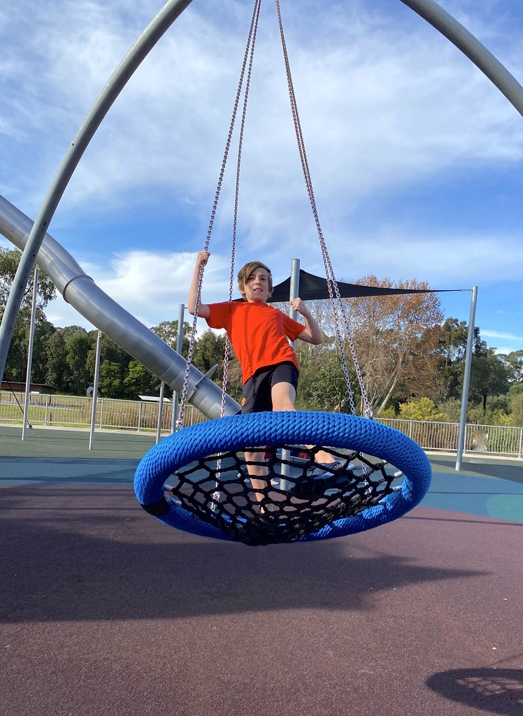 Boy on a swing by kjarn