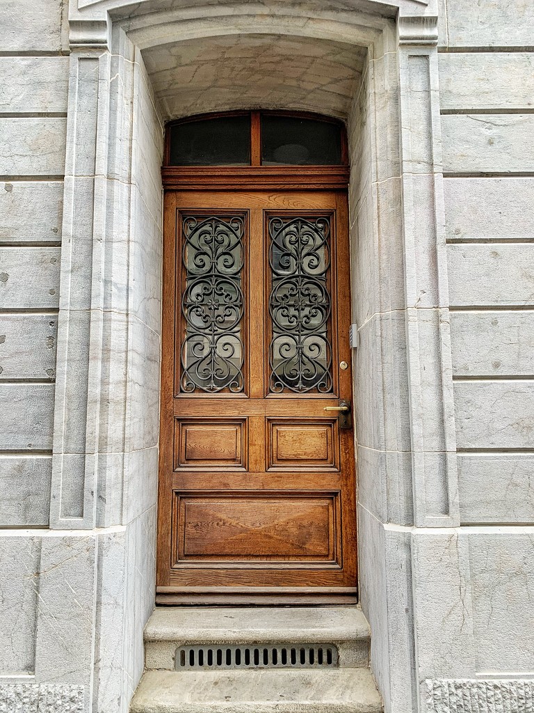 Eight hearts on a brown door.  by cocobella