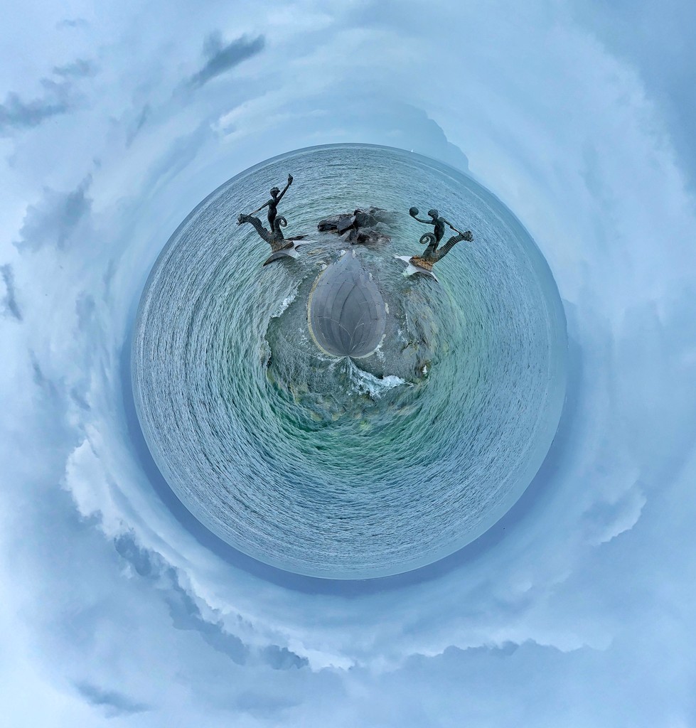 A tiny planet with seahorses.  by cocobella