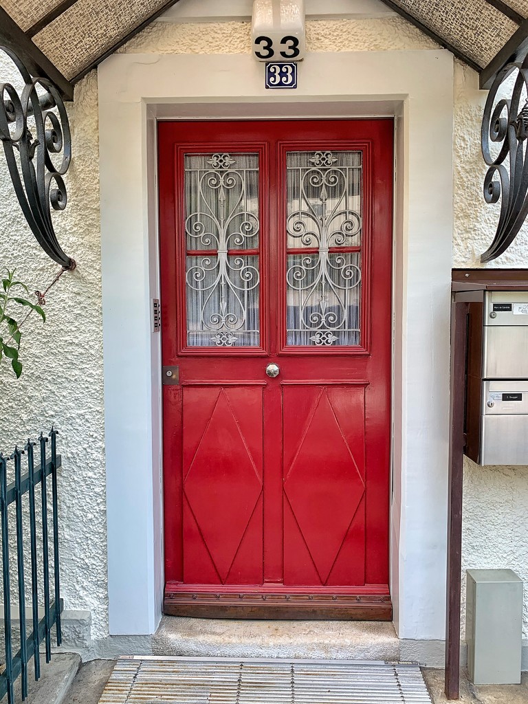 4 hearts on a red door at # 33.  by cocobella