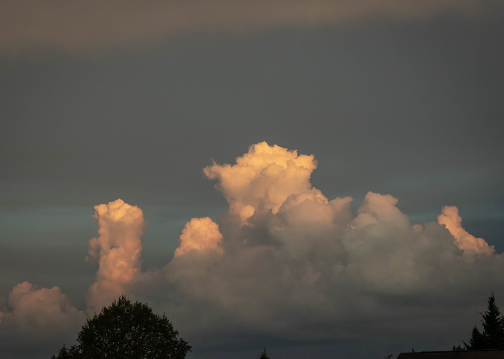 Puffy Sunset Clouds by marylandgirl58