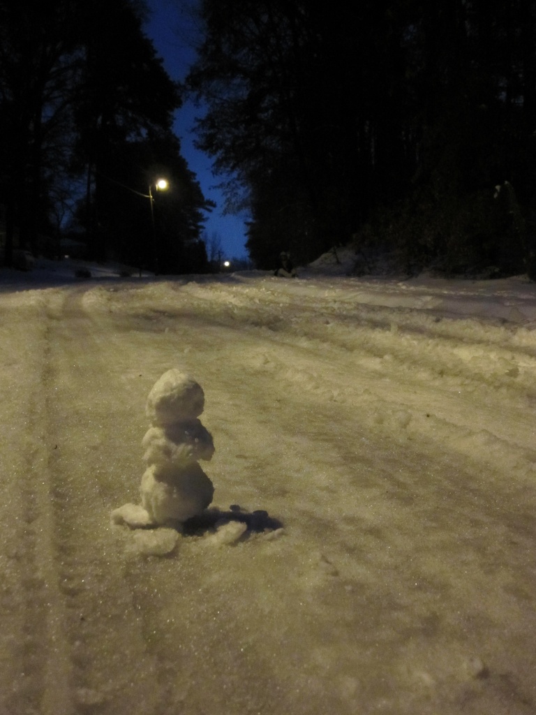 Little snowman in the street by margonaut