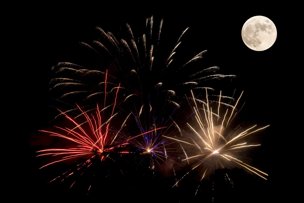 Fireworks Moon by k9photo
