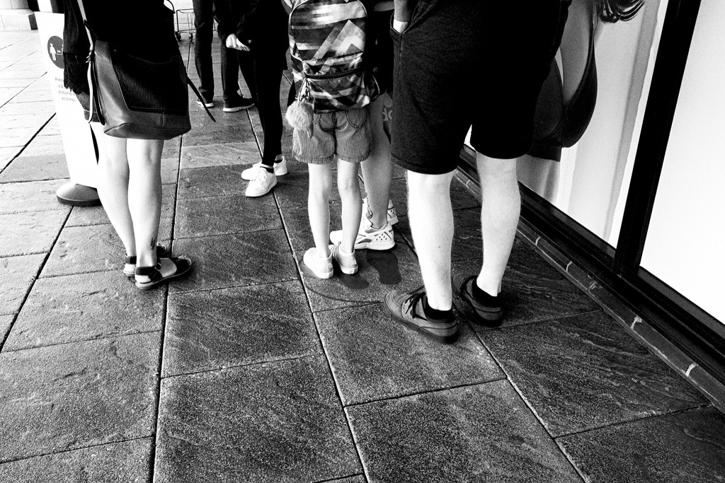 Legs waiting in line by allsop