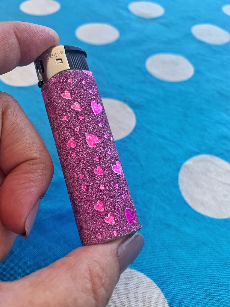 Pink lighter with hearts.  by cocobella