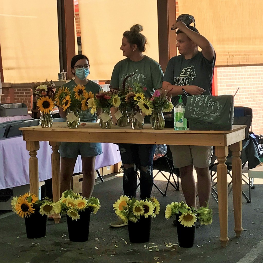 Sunflowers at the Farmer's Market by tunia