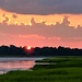Sunset over the marsh at low tide, Ashley River at Charleston  by congaree